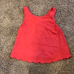 Pink tank top with scalloped detailing